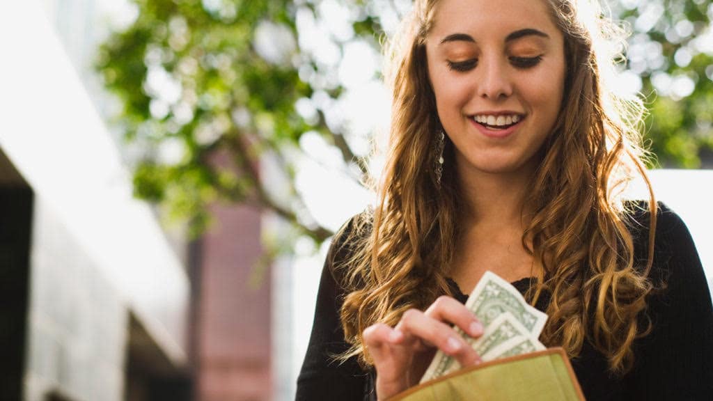 girl counting money