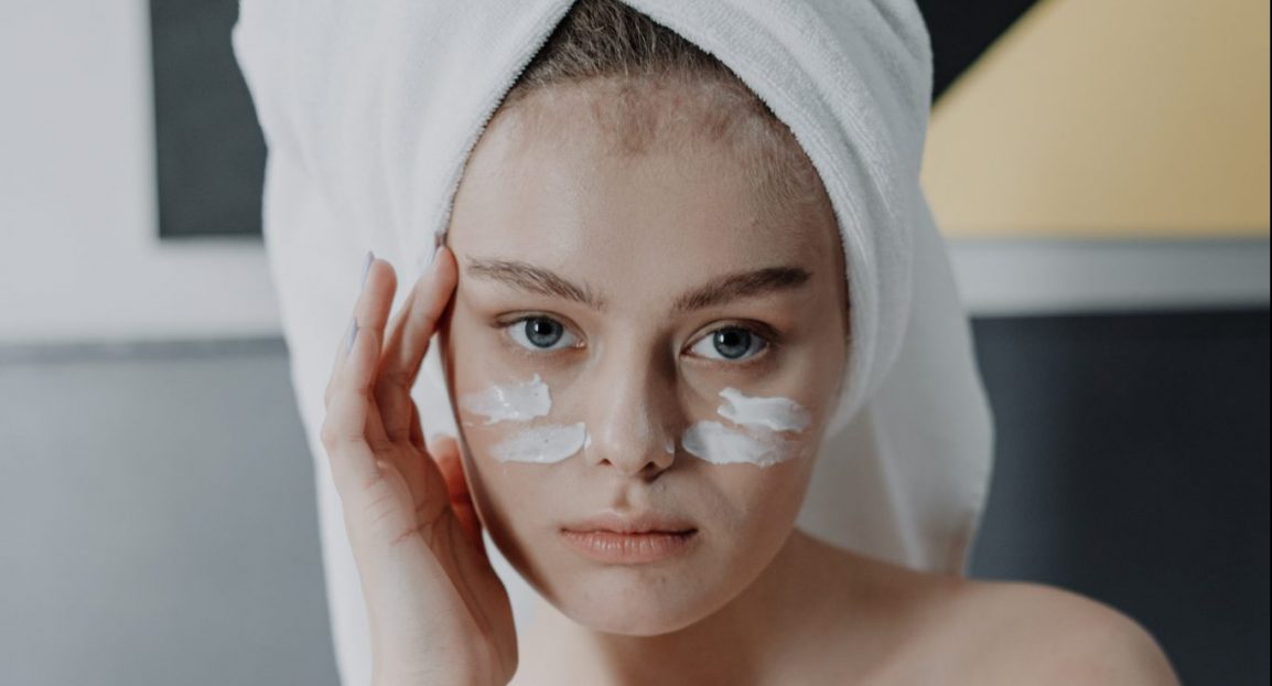 girl washing face