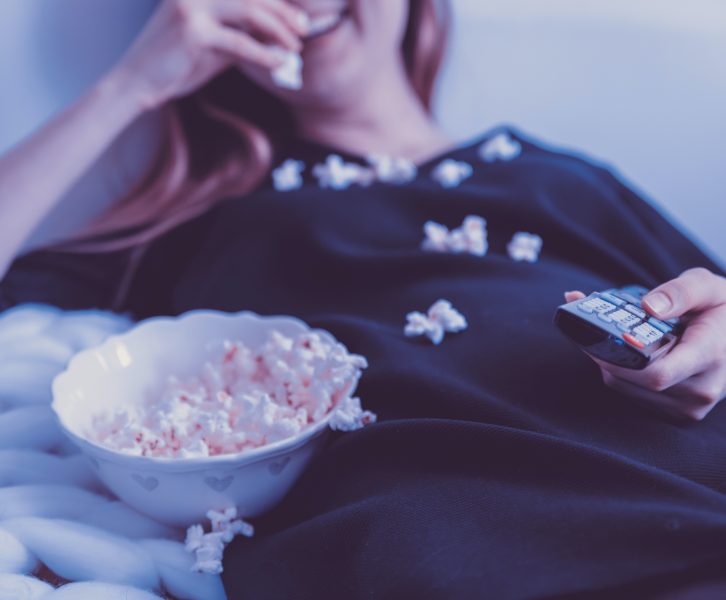 girl eating popcorn