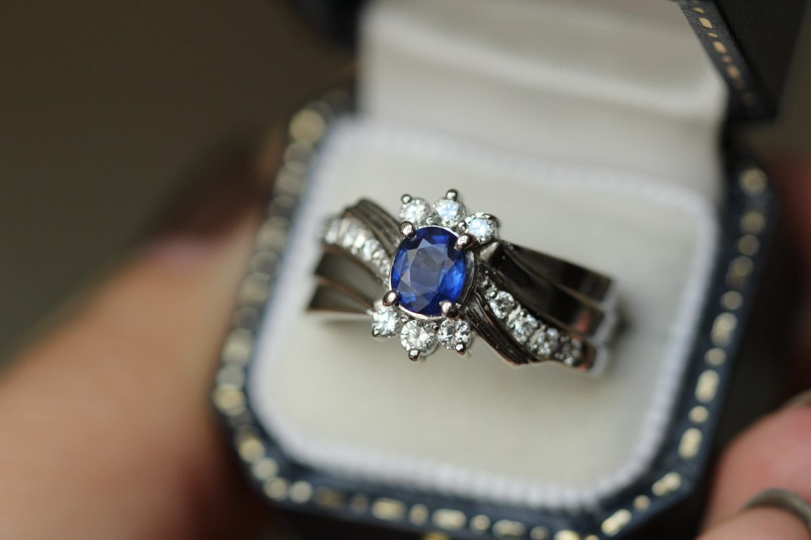 blue gemstone ring in ring box