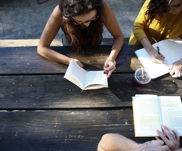 Girls Chatting and Studying