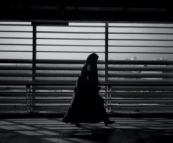 A woman walking in Tehran, Iran